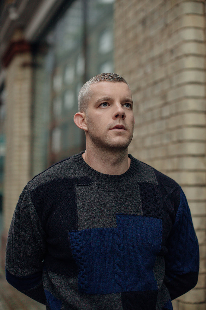 RUSSELL TOVEY WEARS...